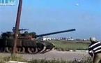 Syrian forces kill two, aim to retake Hama