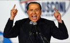 Berlusconi releases love songs on last day in office