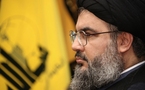 Nasrallah makes rare public show, vows to arm heavily