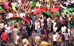 Libya marks revolution day as leader issues warning