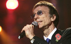 Bee Gees star Robin Gibb wakes from coma: spokesman