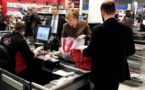Amid crisis, Germany's Merkel goes shopping for toilet paper and wine