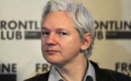Assange defies British police surrender demand