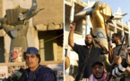 Libya's poor mark Ramadan in rubble of Kadhafi base