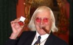 Review slams BBC over Savile report but says no cover-up