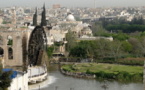 Air strike 'kills 60' as peace envoy Brahimi in Syria