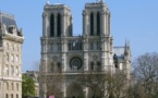 Topless women fete pope's resignation in Paris cathedral