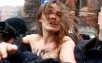 Femen women held in Arab world's first topless protest