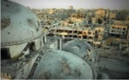 Syria army retakes key Homs rebel district