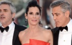 Bullock called space, Clooney did yoga for 'Gravity'