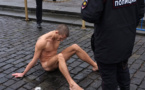 Russia opens case against against scrotum-nailing artist