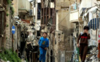 Hundreds evacuated from Syria's Homs on eve of talks