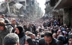 Syria's besieged Yarmuk gets UN aid after two-week halt