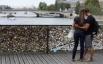 'Locks of love' Paris bridge reopens after railing collapse