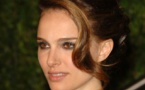 Natalie Portman sits in on retro space-age Dior fashion show