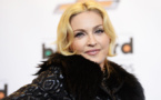 Madonna closes Coachella festival with wet-kiss surprise