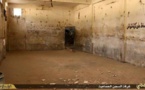 IS destroys infamous Syria prison as regime bombing kills scores