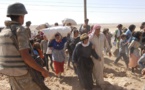 Tens of thousands flee new Syria offensives