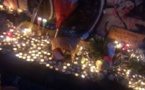 World sings, lights up in solidarity with wounded France