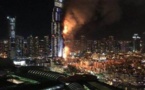 'One hour, then that's it': Dubai fire survivor hangs from balcony