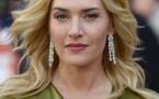 Golden Globes open with sharp jokes, win for Winslet